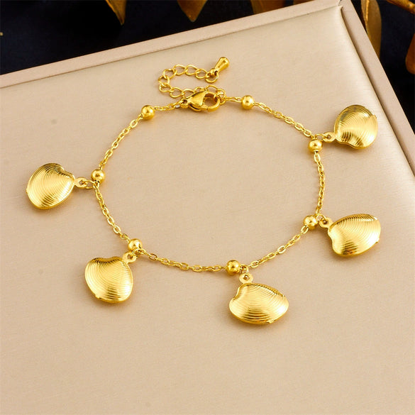 Stainless Steel Goldplated Animal Zodiac Style Bracelet With Tropical Fish Starfish Scallop Design