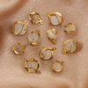 Stainless Steel Handmade Jewelry Accessories With Cat's Eye Stone Twist Flower Pendant And Electroplating Treatment