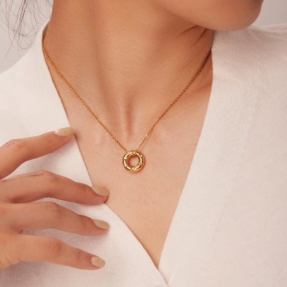 Stainless Steel Women's Necklace With 18K Gold Hollow Round Inlaid Zircon Pendant And Electroplating Treatment