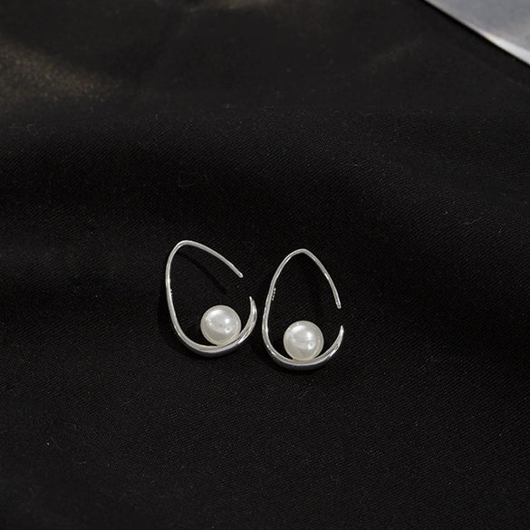 Sterling Silver Hollow Teardrop Earrings With Shell Bead Details And Ear Hook Design For Women