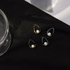 Sterling Silver Hollow Teardrop Earrings With Shell Bead Details And Ear Hook Design For Women