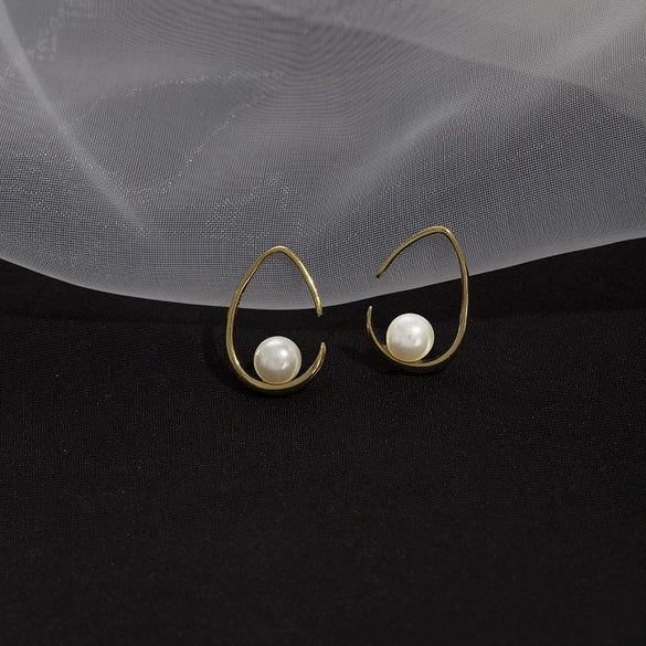 Sterling Silver Hollow Teardrop Earrings With Shell Bead Details And Ear Hook Design For Women