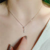 Sterling Silver Water Drop Necklace Plated With 14K Gold Vertical Strips Inlaid With Diamonds