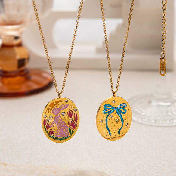 Titanium Steel Bow And Rabbit Element Pet Oval Tarot Necklace With Oil Dripping Pattern Colorpreserving 18K Gold Electroplating