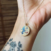 Titanium Steel Bow And Rabbit Element Pet Oval Tarot Necklace With Oil Dripping Pattern Colorpreserving 18K Gold Electroplating