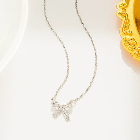 Titanium Steel Diamondencrusted Bow Ochain Necklace With Geometric Design And Electroplating Treatment