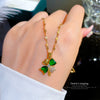 Titanium Steel Geometric Diamond Micro Set Zircon Emerald Four Break Flower Pendant Necklace Copper Plated Gold