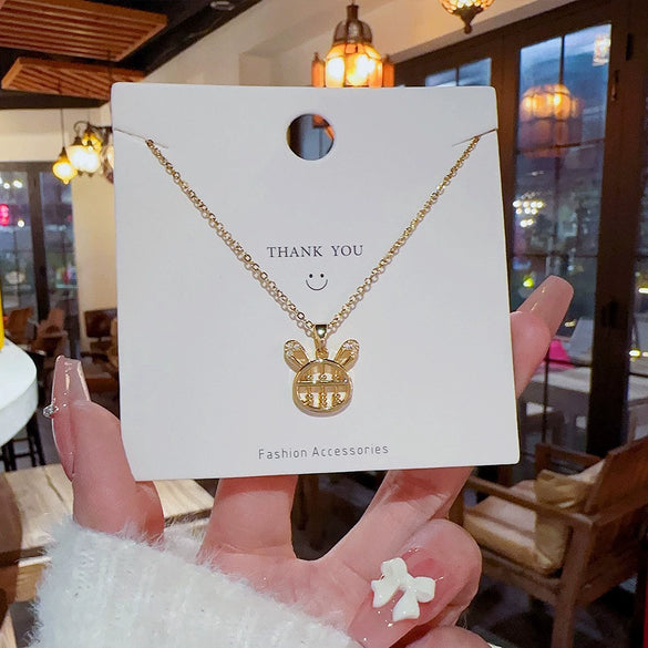 Titanium Steel Gold Inlaid Bow Pendant Necklace Cross Chain Style