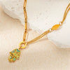 Titanium Steel Goldplated Personality Spliced Palm Eyes Cut Out Necklace And Earrings Set