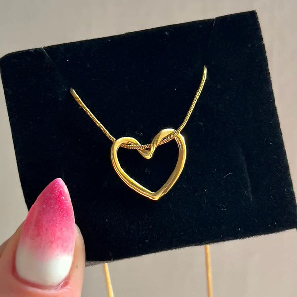 Titanium Steel Heart Hollow Pendant Women's Snake Bone Chain Necklace With Electroplating Design
