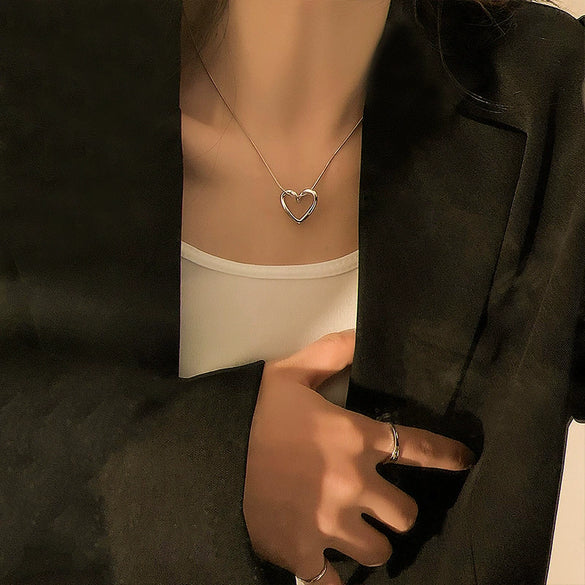 Titanium Steel Heart Hollow Pendant Women's Snake Bone Chain Necklace With Electroplating Design