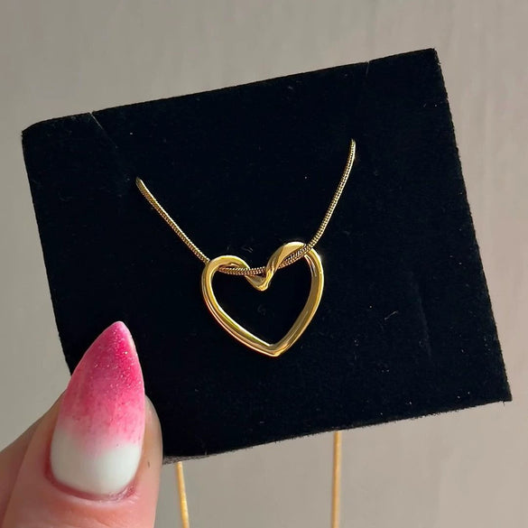 Titanium Steel Heart Hollow Pendant Women's Snake Bone Chain Necklace With Electroplating Design