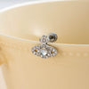 Titanium Steel Inlaid Zircon Lady Saturn Perforated Earrings