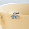 Titanium Steel Inlaid Zircon Lady Saturn Perforated Earrings