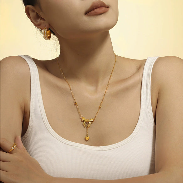 Titanium Steel Plated 18K Gold Women's Clavicle Necklace With Love Tassel Bow And Geometric Pattern