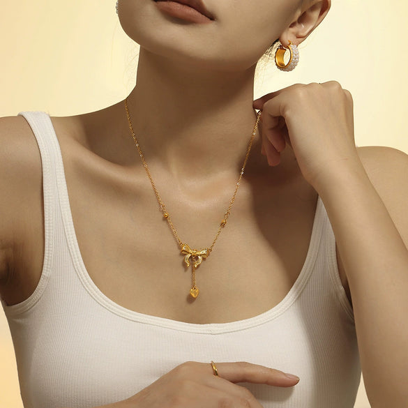 Titanium Steel Plated 18K Gold Women's Clavicle Necklace With Love Tassel Bow And Geometric Pattern