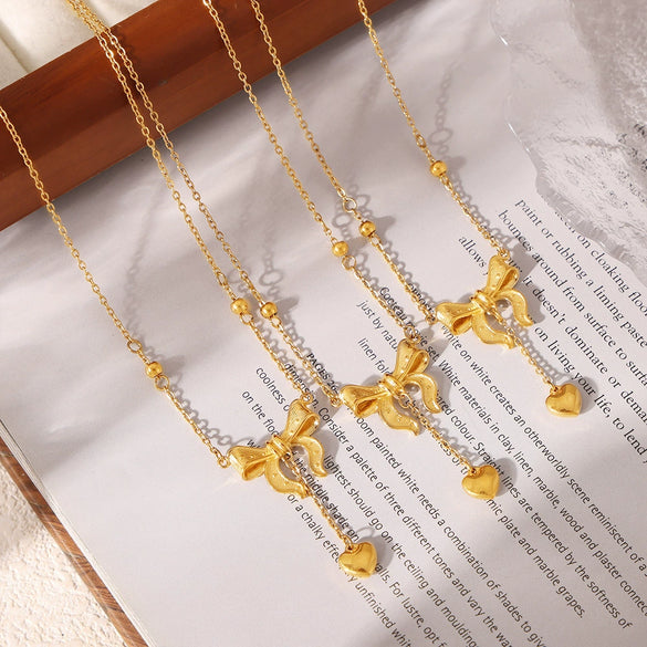 Titanium Steel Plated 18K Gold Women's Clavicle Necklace With Love Tassel Bow And Geometric Pattern