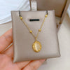 Titanium Steel Rotating Cat's Eye Stone Necklace With Geometric Pattern Electroplating For Unisex Cartoon Style