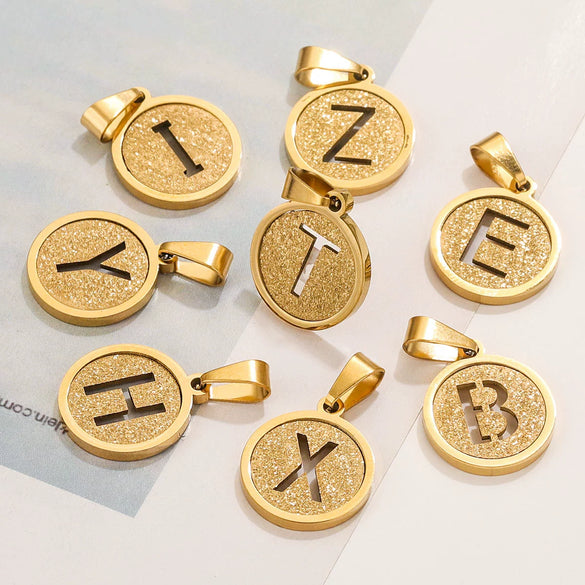 Titanium Steel Round Letter Pendant Jewelry With Sand Pressure And Electroplating Design