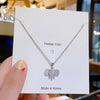 Titanium Steel Women's Light Luxury Geometric Patterned Auspicious Elephant Pendant Cross Chain Necklace