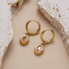 Titanium Steel Women's Oval Zircon Inlaid Pendant And Earrings With Geometric Style