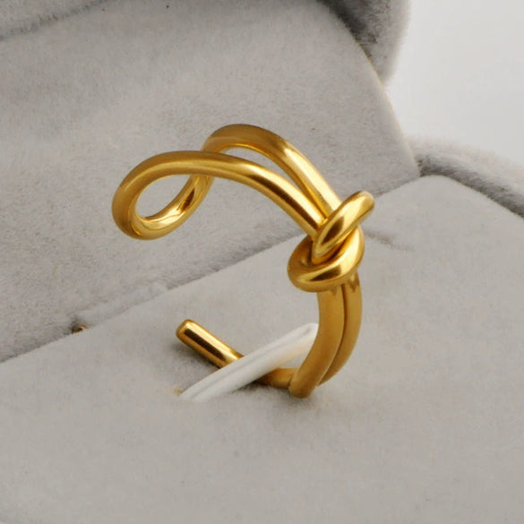 Titanium Steel Women's Ring Plated 18K Gold Simple Knot Open Ring With Star Pattern