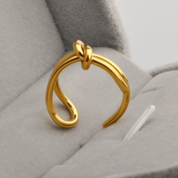Titanium Steel Women's Ring Plated 18K Gold Simple Knot Open Ring With Star Pattern