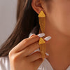 Trendy Titanium Steel Electroplated Women's Earrings With Geometric Pattern And Triangle Devil's Eye Long Round Bead Tassel