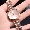 Universal Casual Alloy Case Round Dial Quartz Watch With Steel Band And Ordinary Glass Mirror