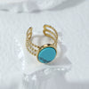 Vintage Embossed Stainless Steel Hollow Ring With Natural White Fritillaria Turquoise