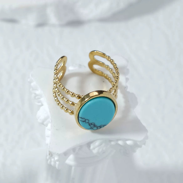 Vintage Embossed Stainless Steel Hollow Ring With Natural White Fritillaria Turquoise