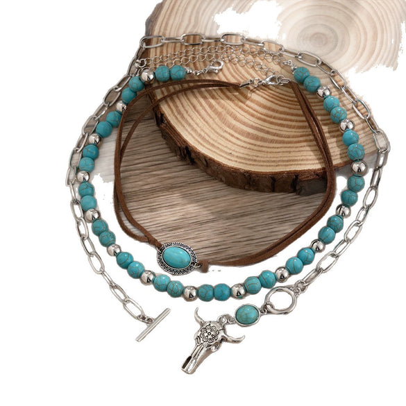 Vintage Imitation Turquoise Bull Head Beaded Necklace Set With Polished Electroplated Metal Chains And Geometric Stacking Design