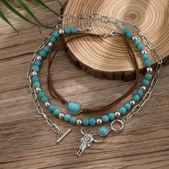 Vintage Imitation Turquoise Bull Head Beaded Necklace Set With Polished Electroplated Metal Chains And Geometric Stacking Design