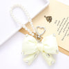 Wholesale Acrylic Bird's Nest Beaded Mobile Phone Pendant With Pu Leather Rope And Bow Semi Manual Crafted