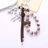 Wholesale Acrylic Bird's Nest Beaded Mobile Phone Pendant With Pu Leather Rope And Bow Semi Manual Crafted