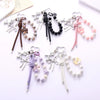 Wholesale Acrylic Bird's Nest Beaded Mobile Phone Pendant With Pu Leather Rope And Bow Semi Manual Crafted
