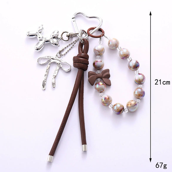 Wholesale Acrylic Bird's Nest Beaded Mobile Phone Pendant With Pu Leather Rope And Bow Semi Manual Crafted