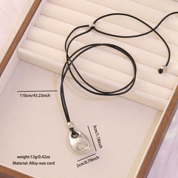 Wholesale Adjustable Sweater Chain Necklace With Geometric And Heart Shape Alloy Pendant And Black Braided Rope