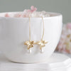 Wholesale Alloy And Pearl Drop Shape Bow Leaf Earrings With Electroplating Jewelry