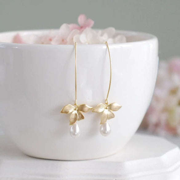Wholesale Alloy And Pearl Drop Shape Bow Leaf Earrings With Electroplating Jewelry