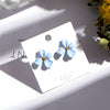 Wholesale Alloy Baking Paint Four Leaf Clover Flower Earrings For Women