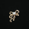 Wholesale Alloy Brooch With Bow Shape Electroplated And Diamondencrusted