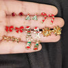 Wholesale Alloy Christmas Earrings With Elk And Cartoon Characters Electroplating Design