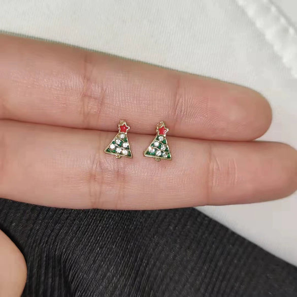 Wholesale Alloy Christmas Earrings With Elk And Cartoon Characters Electroplating Design