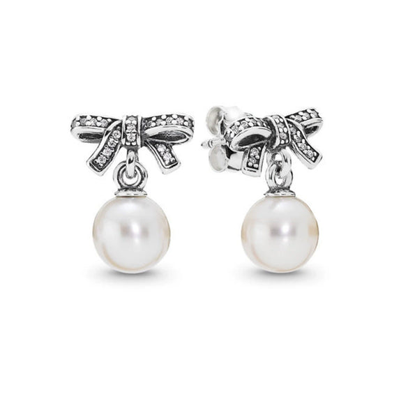 Wholesale Alloy Constellation Diamond Inlaid Zircon Bow Pearl Earrings