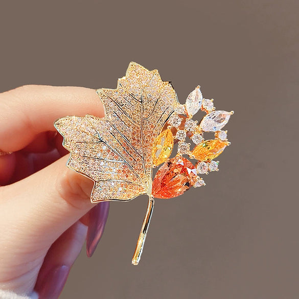 Wholesale Alloy Crystal Retro Hollow Maple Leaf Flower Brooch For Women With Electroplating