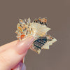 Wholesale Alloy Crystal Retro Hollow Maple Leaf Flower Brooch For Women With Electroplating