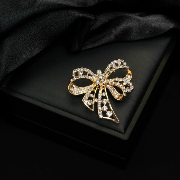 Wholesale Alloy Diamondencrusted Hollow Retro Bow Brooch For Women Electroplated