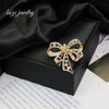 Wholesale Alloy Diamondencrusted Hollow Retro Bow Brooch For Women Electroplated