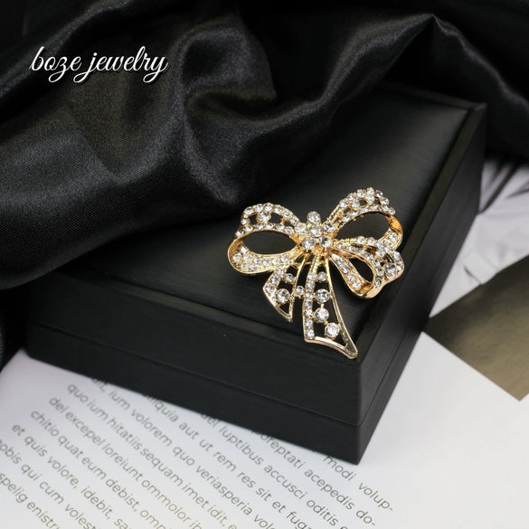 Wholesale Alloy Diamondencrusted Hollow Retro Bow Brooch For Women Electroplated